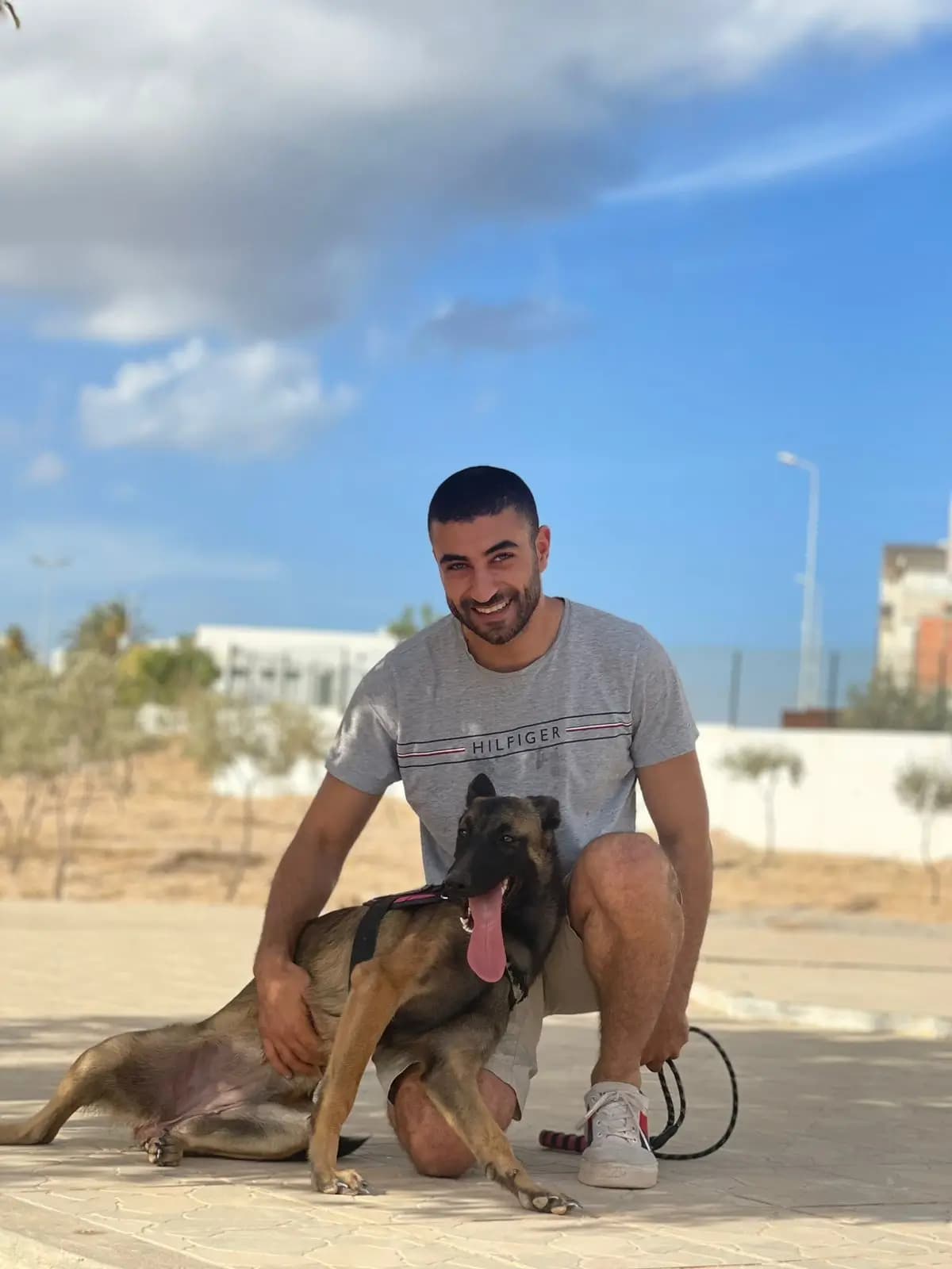 Khairi SLAMA with his dog